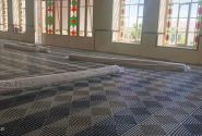 نصب کفپوشهای محافظتی فرشهای تاریخی در تالار تشریفات عمارت ساعت